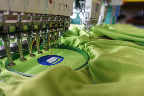 Embroidery machine needle in Textile Industry at Garment Manufac T-shirt Embroidery